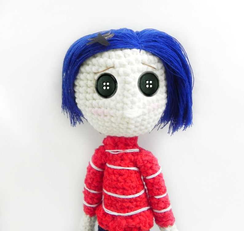 Create your own Coraline doll with this knitting pattern